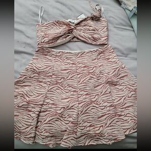 Brown and cream discovery skirt and shirt set size Medium